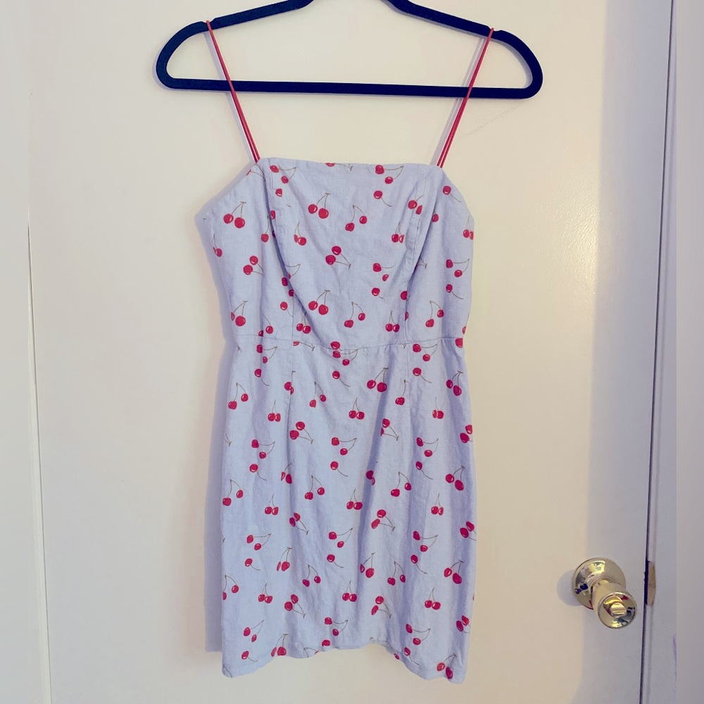 Mini skater dress in size small with cherry pattern